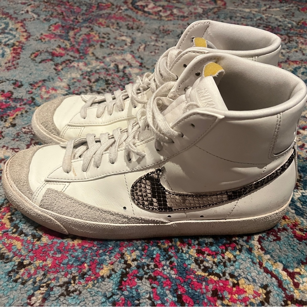 Nike White High-Tops with Black Patterned Swoosh